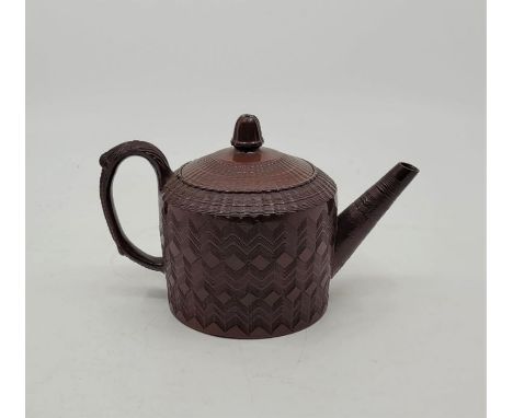 A late 18th century English Redware stoneware engine turned teapot and cover, Staffordshire, impressed mark to base, height 9