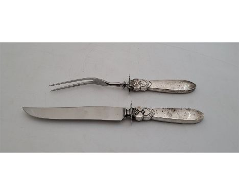 A sterling silver handled "Cactus pattern" carving knife and fork set,&nbsp;attributed to Georg Jensen, stamped "Sterling Sil