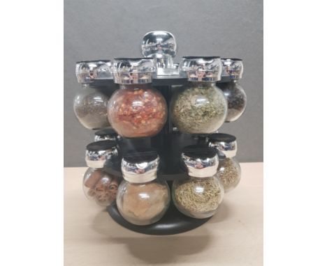 REVOLVING SPICE RACK CONTAINING 16 DIFFERENT SPICES