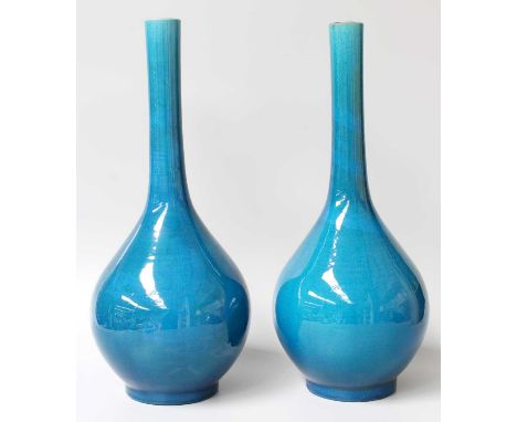 A Pair of Japanese Earthenware Bottle Vases, Meiji period, decorated in turquoise crackled glaze, 38cm high (2)No major chips