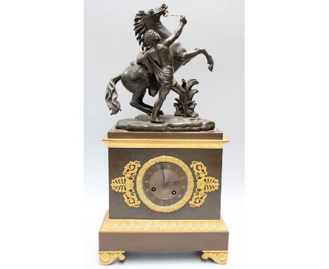 A Gilt Metal Mounted Mantel Clock, surmounted by a Marley horse, twin barrel movement, striking on a bell, movement backplate