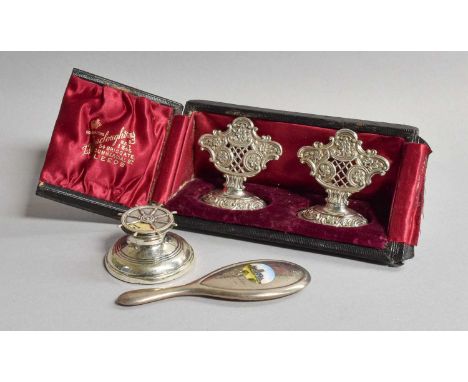 A Collection of Assorted Silver, comprising a cased pair of place-card holders, each with openwork and stamped foliage scroll