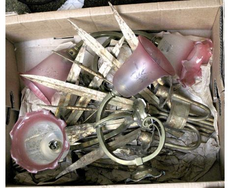 A Set of Four Early 20th Century Brass Single Light Wall Sconces, of scroll form and with cranberry tinted glass shades, and 