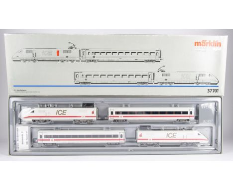 A Marklin 4-car DB ICE high speed train pack (37701). Comprising to power cars and two intermediate passenger coaches. All in