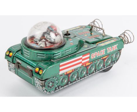 A Modern Toys battery powered with mystery action tinplate M-18 Space Tank. Finished in metallic green with litho printed det