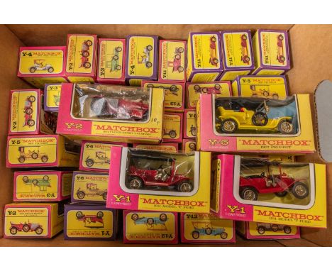 100x Matchbox Models of Yesteryear. Including 38x examples in early pink and yellow/mauve and yellow window boxes, 6x cream b