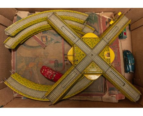 2 German D.R.P. clockwork tinplate roadway sets. Comprising a part set with a central crossroad and 6 curved pieces of track,