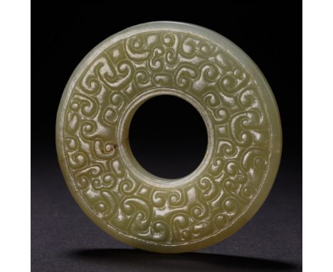 a round flat piece of jade from  the Han dynasty   diameter5.3cm    Wight25g