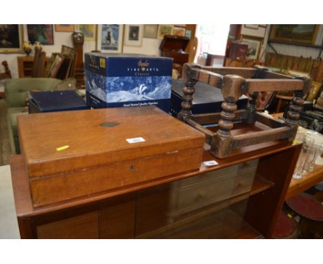 A golden oak cutlery box by Mappin &amp; Webb; and a wooden stool base 