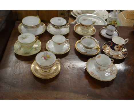 A quantity of various decorative china cups and saucers 