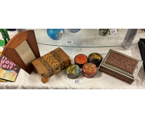 A quantity of wooden boxes (including a musical one) and a nice picture frame