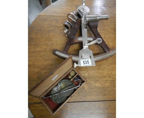 An old Edwardian set of gold scales &amp; 20th century sextant in good order.