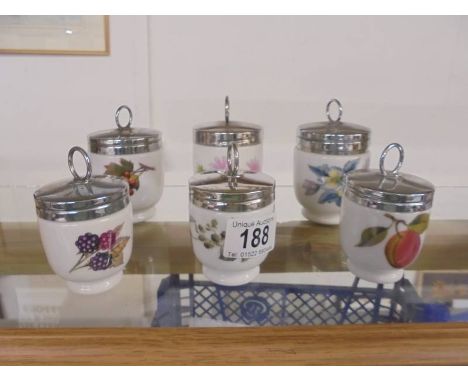 Five Royal Worcester egg coddlers and a Crown Staffordshire egg coddler.