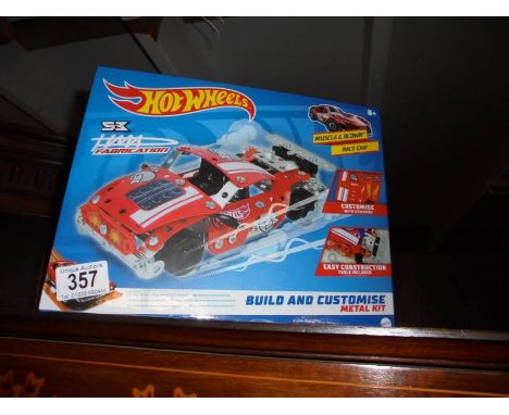 A Hot Wheels Muscle &amp; Blone race car metal set, sealed.