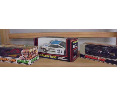 3 Boxed Scalextric cars - C.113 Triumoh TR7, C106 Wolf WRS Formula 1 car and a C283 rover SD1 3500.