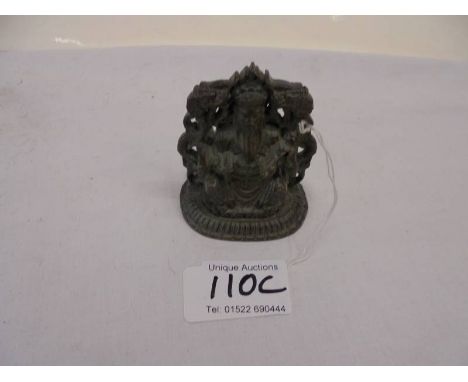 A small bronze Chinese Deity.