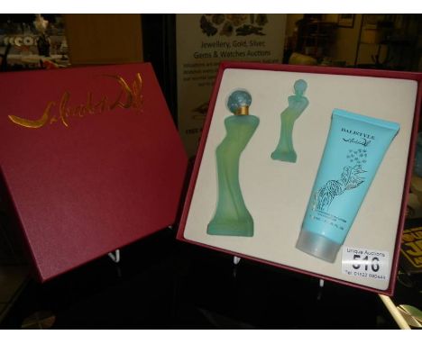 A Salvador Dali boxed perfume set with two Dali style 100m perfumes.