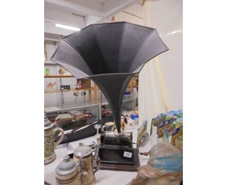 A Victorian Edison Gem phonograph with horn (missing lid).