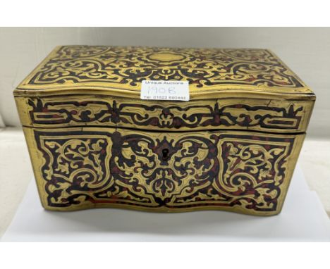 A 19th century French boulle inlaid tea caddy with serpentine front