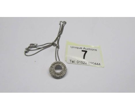 A diamond circle pendant of a 9ct gold chain, 4.45 grams.