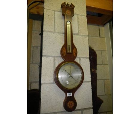 An inlaid banjo barometer.