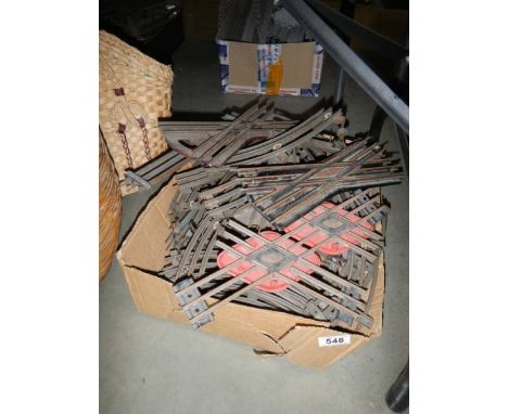 A box of German three rail 'O' gauge track including Marklin, Bink, OK etc.,