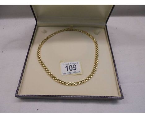 A 9ct gold neck chain, 15.69 grams.Length 43cm, in good condition. Clasp working. Stamped 375.