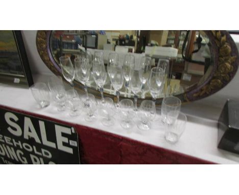 A quantity of wine glasses etc.,