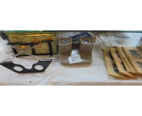 A vintage view master with slides , A Pana-view stereoscope and slides etc.,