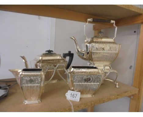 A superb quality four piece silver plate teaset comprising spirit kettle with burner, teapot, milk jug and sugar bowl.