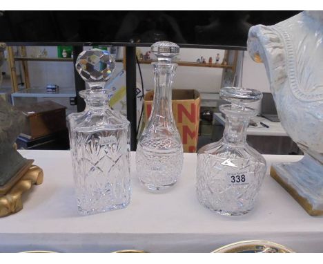 Three good quality cut glass decanters.