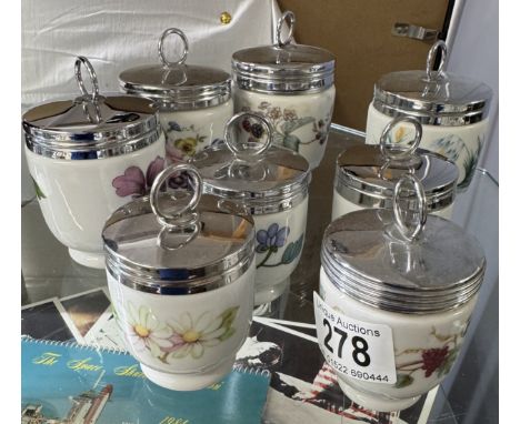 8 Royal Worcester egg coddlers.