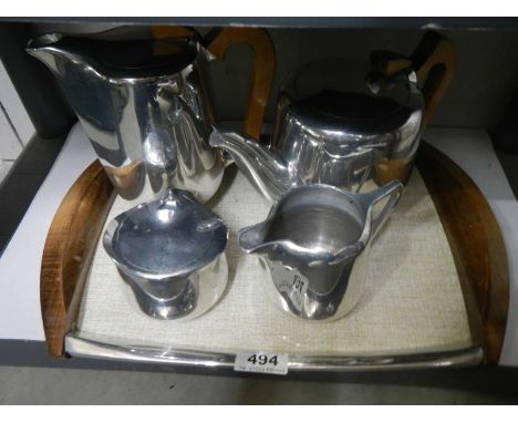 A retro Picquot ware four piece tea set on tray.