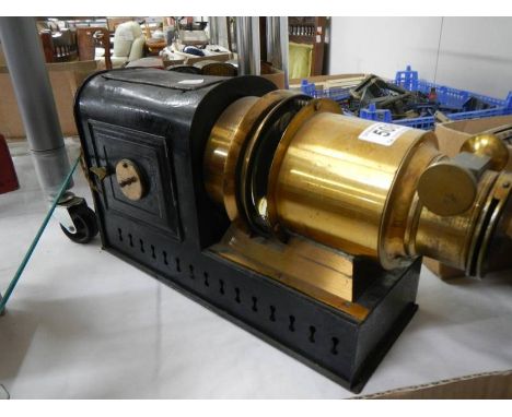 A Victorian Magic Lantern projector.