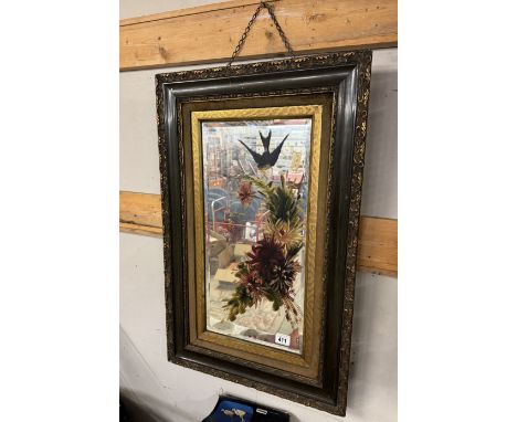 An Edwardian painted bevel edged mirror.