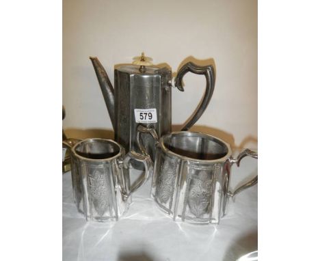 A three piece silver plate tea set.