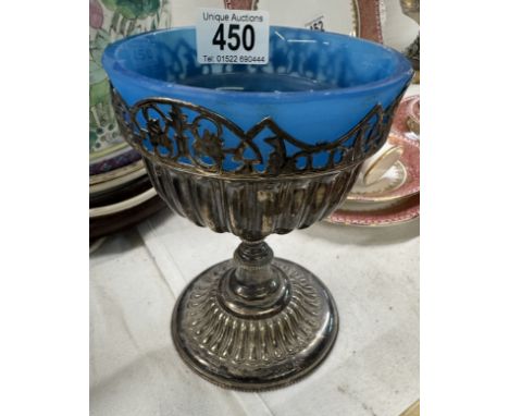 An early 20th century blue glass bowl in silver plate stand