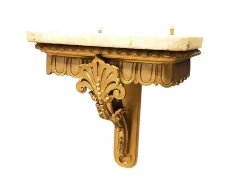 GILT CLOCK BRACKET, with rectangular marble top41.5cm wideThis lot is in somewhat good condtion, with some signs of age. The 