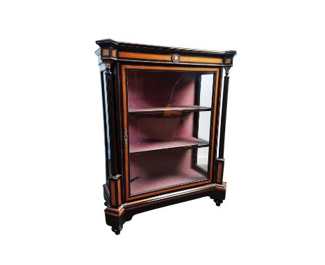 VICTORIAN EBONISED AND WALNUT CROSSBANDED VITRINE, the shelved interior enclosed by a single glazed door, flanked by outset C