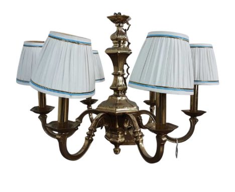 GILTMETAL CHANDELIER, OF BAROQUE DESIGN with six scrolling branches issuing from the hexagonal column55cm high