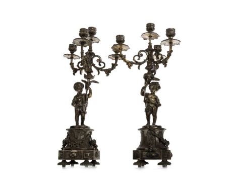 PAIR OF SILVER PLATED THREE BRANCH CANDELABRA, LATE 19TH/EARLY 20TH CENTURY each branch issuing from a central sconce, over a