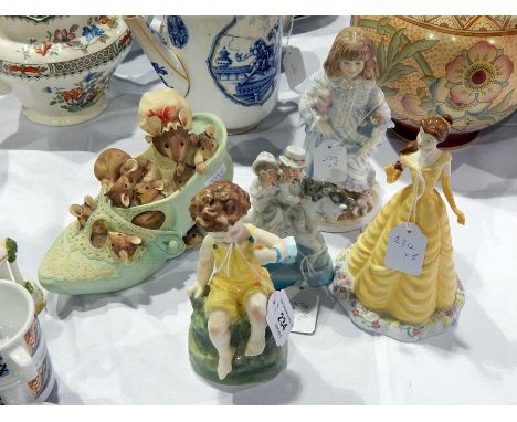 Royal Worcester china figure "Friday's Child", another "Lullaby", Royal Doulton Princess bell and two other models (5) 