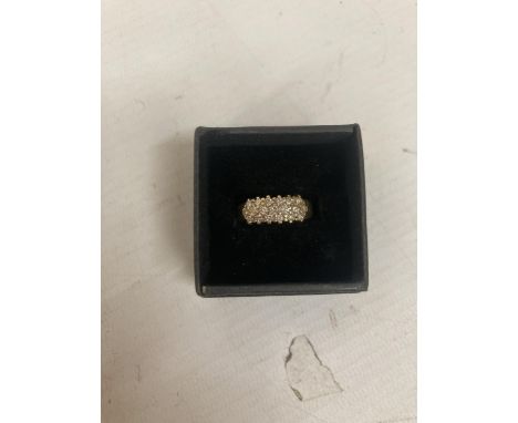 A MARKED 9K RING WITH 19 DIAMONDS SIZE J/K GROSS WEIGHT 3.9 GRAMS IN A PRESENTATION BOX 