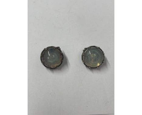 A PAIR OF VINTAGE BLUE GLASS CABACHON CLIP ON EARRINGS (POSSIBLY SILVER) 
