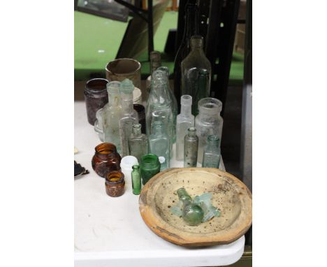 A QUANTITY OF VINTAGE GLASS BOTLLES TOGETHER WITH JARS AND DISH 