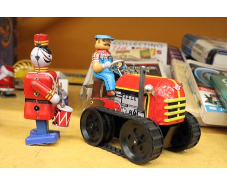 TWO TIN PLATE TOYS TO INCLUDE A TRACTOR AND A TIN SOLDIER 