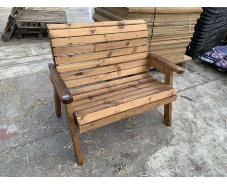 AN AS NEW EX DISPLAY CHARLES TAYLOR TWO SEATER GARDEN BENCH *PLEASE NOTE VAT TO BE ADDED TO THE HAMMER PRICE OF THIS LOT* 