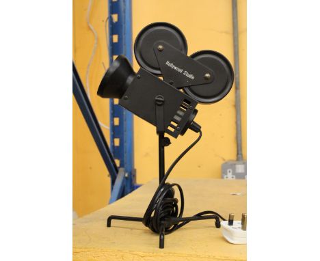 A VINTAGE HOLLYWOOD STUDIO LAMP IN WORKING ORDER - NO WARRANTY GIVEN 