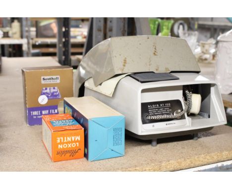 AN ALDIS XT 150 SLIDE PROJECTOR WITH SLIDES TOGETHER WITH A SOUTHALL UNIVERSAL SLICER AND AN ALADDIN LOXON MANTLE 