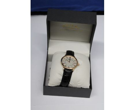 A BOXED ROTARY GENTS WRIST WATCH WITH INXTRUCTIONS AND WARRANTY CARD (NEEDS NEW BATTERY) 